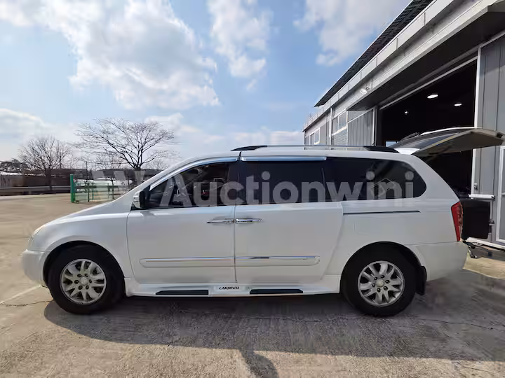 Kia Grand Carnival 2012 — 2