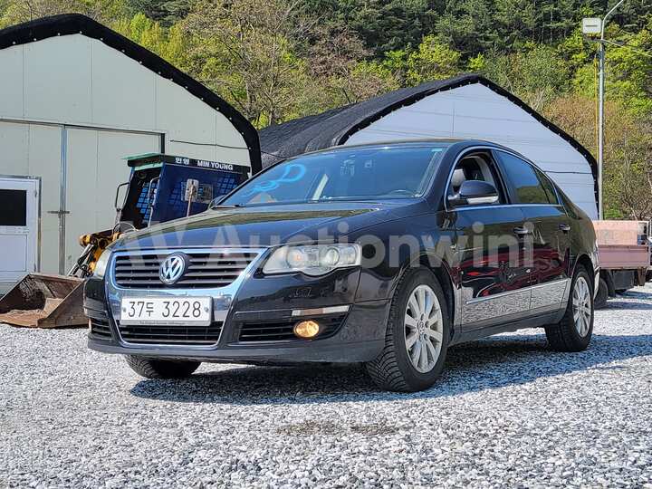 Volkswagen Passat 2010 — 2