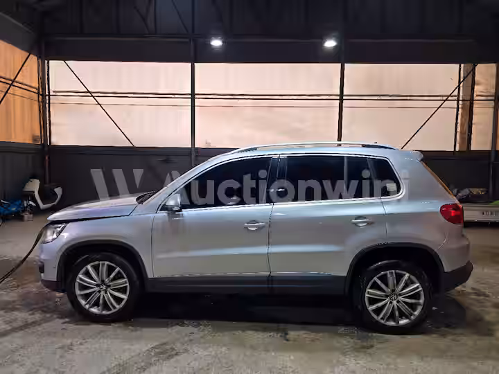 Volkswagen New Tiguan 2012 — 2