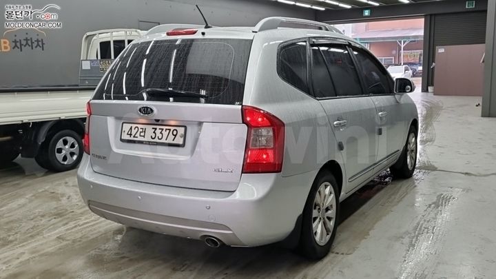 Kia Carens 2013 — 2