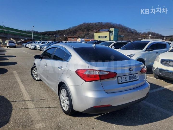 Kia K3 2013 — 4
