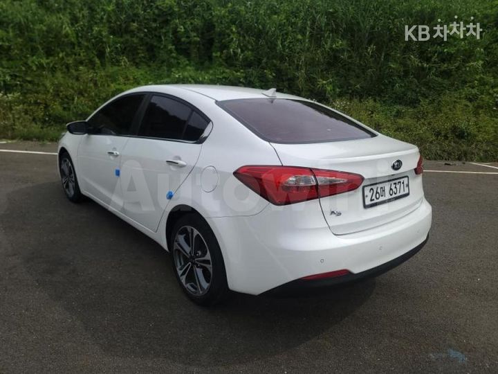 Kia K3 2015 — 4