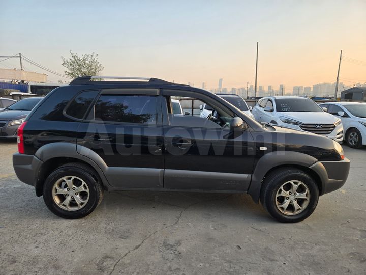 Hyundai Tucson 2009 — 2