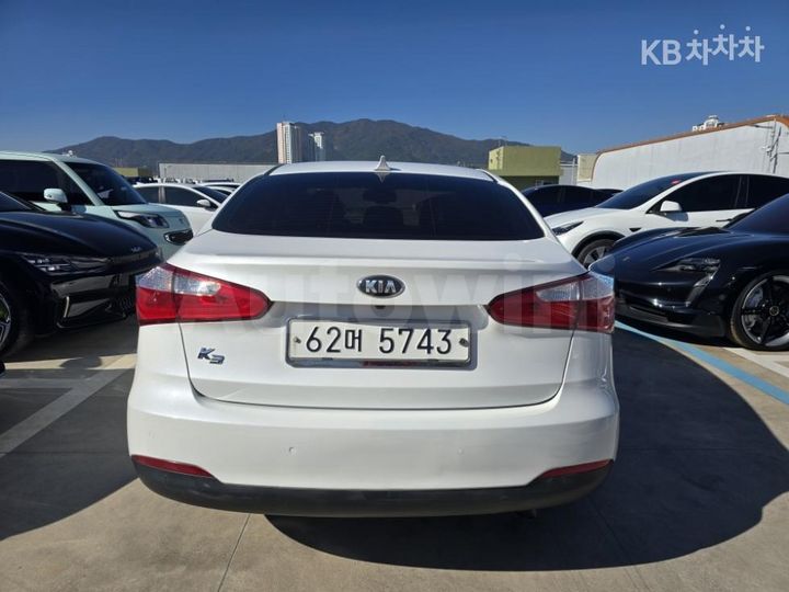 Kia K3 2015 — 4