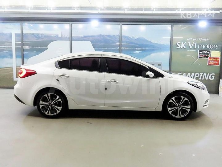 Kia K3 2015 — 3