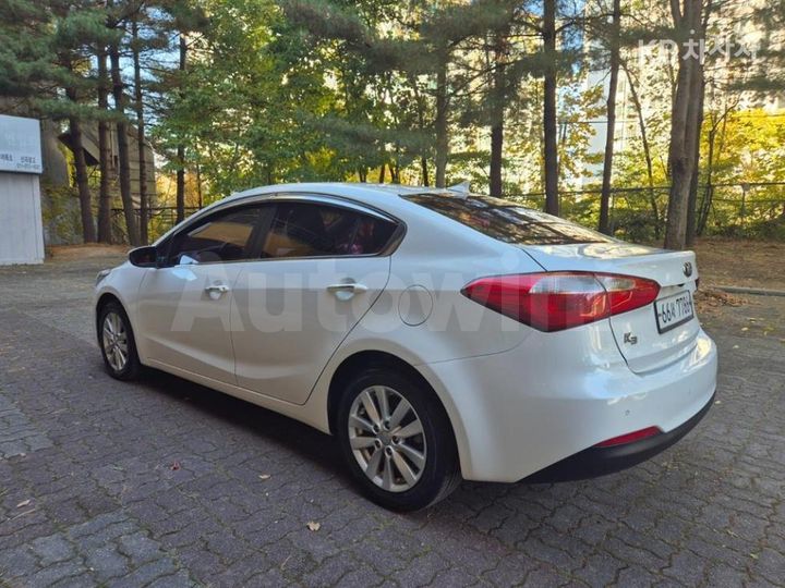 Kia K3 2015 — 4