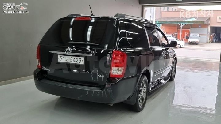 Kia Carnival 2013 — 2