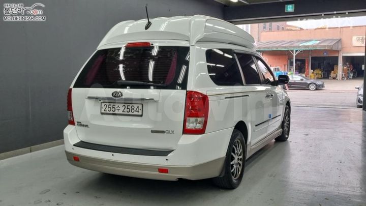 Kia Carnival 2013 — 2