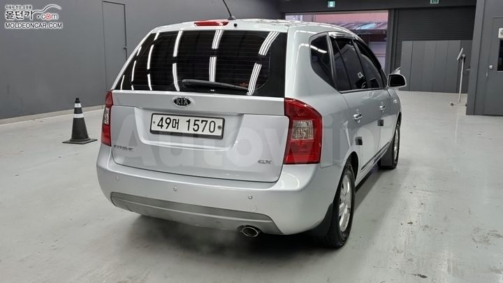 Kia Carens 2013 — 2