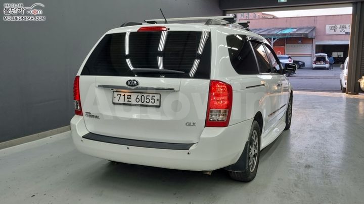 Kia Carnival 2013 — 2