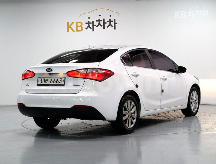 Kia K3 2014 — 3