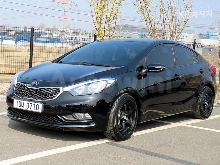 Kia K3 2015 — 2