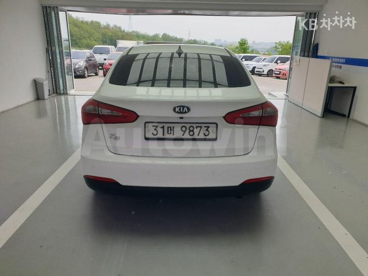 Kia K3 2014 — 4