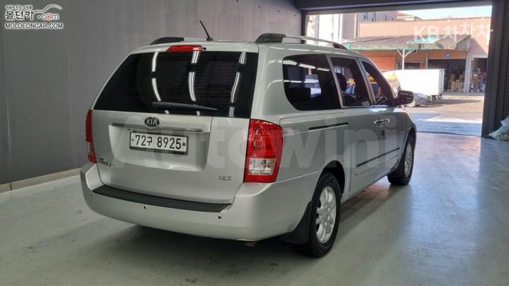 Kia Carnival 2013 — 2