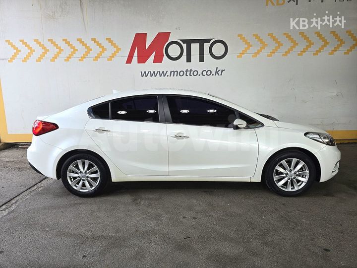 Kia K3 2015 — 4
