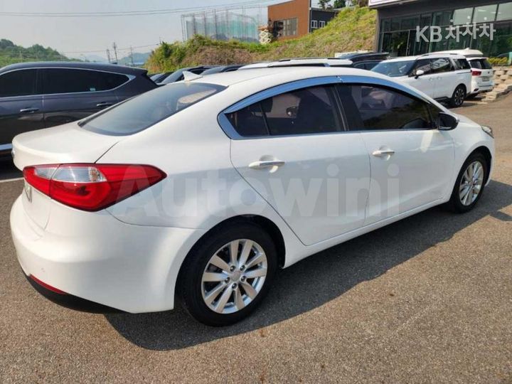 Kia K3 2015 — 4