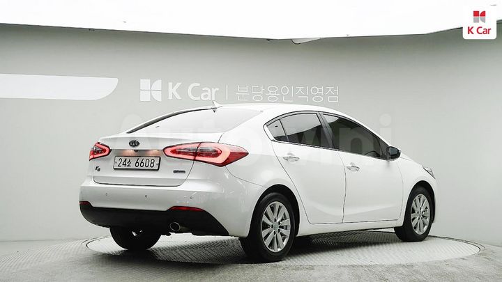 Kia K3 2015 — 4