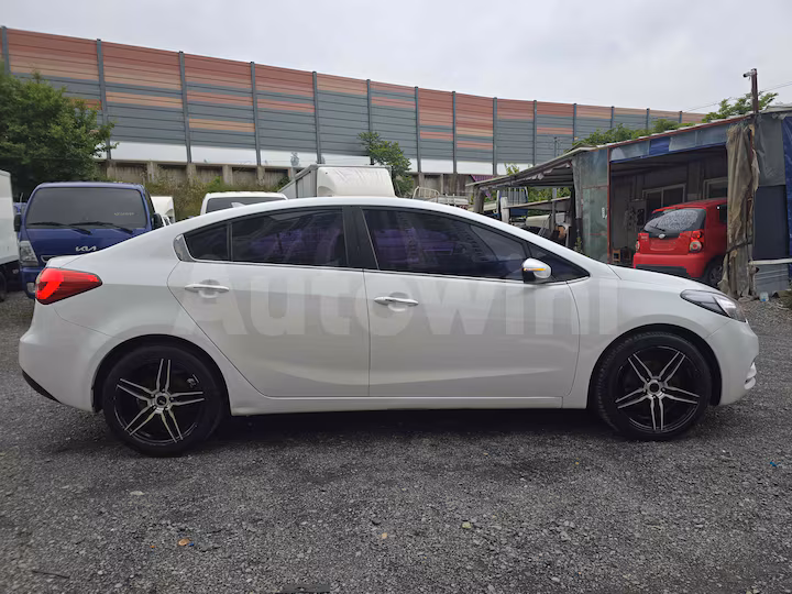 Kia K3 2014 — 4