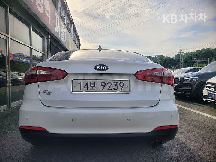 Kia K3 2015 — 4