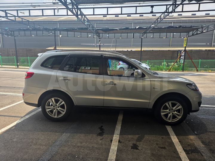 Hyundai SantaFe 2011 KMHSJ81UBBU642602 — 4