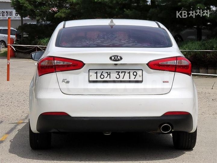 Kia K3 2013 — 4