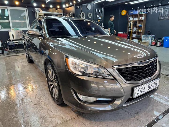 Kia K7 2012 KNALM415BCA063648 — 2