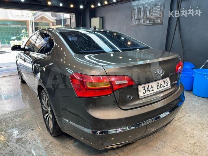 Kia K7 2012 KNALM415BCA063648 — 5