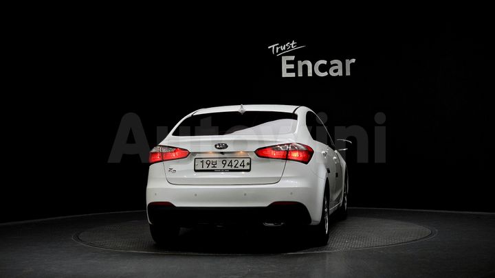 Kia K3 2015 — 4