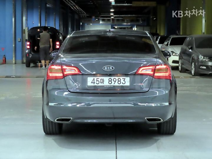Kia K7 2012 KNALM415BCA091525 — 3