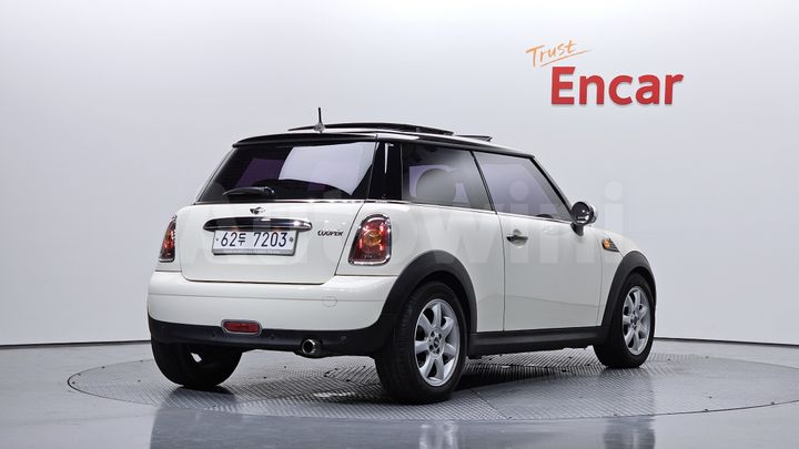 Mini Cooper 2010 — 2