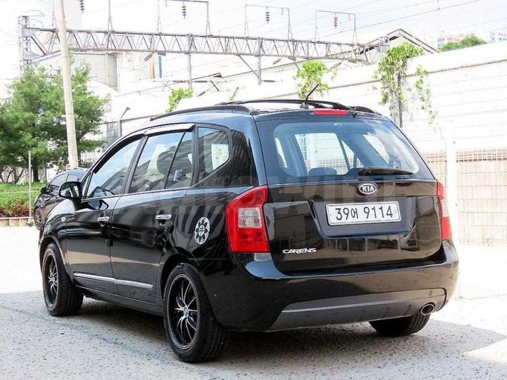 Kia Carens 2007 KNAFG52237K077414 — 3