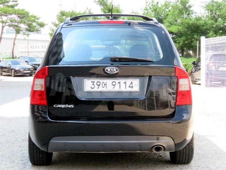 Kia Carens 2007 KNAFG52237K077414 — 4