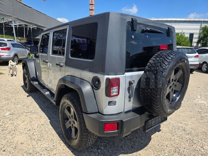 Jeep Wrangler 2009 1J4GAE9579L702071 — 4