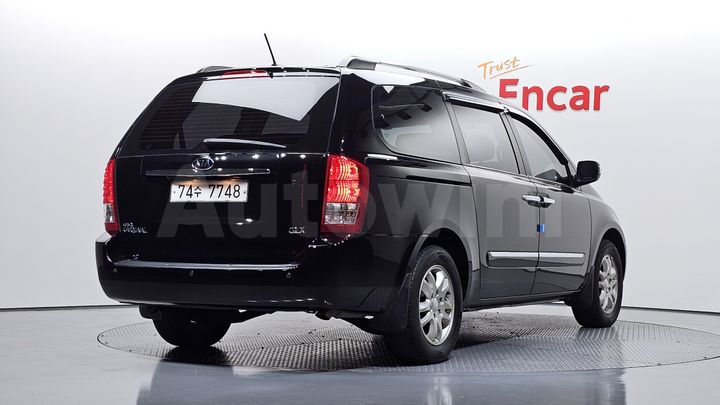 Kia Carnival 2012 — 2