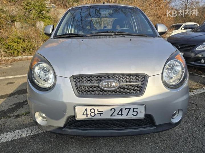 Kia Morning 2009 KNABA24439T714982 — 2