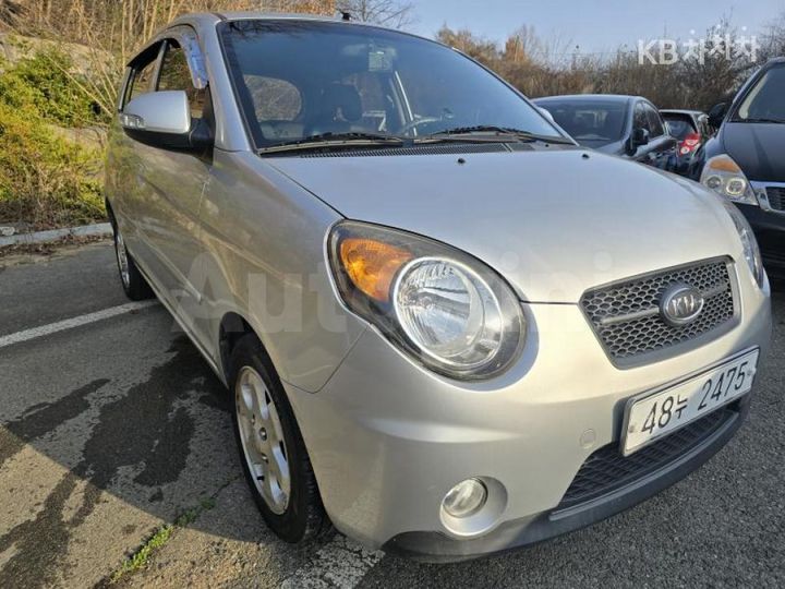 Kia Morning 2009 KNABA24439T714982 — 3