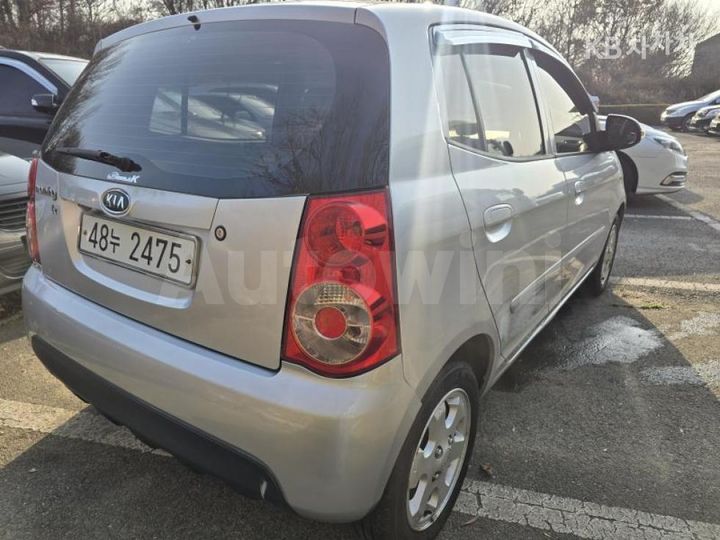 Kia Morning 2009 KNABA24439T714982 — 4