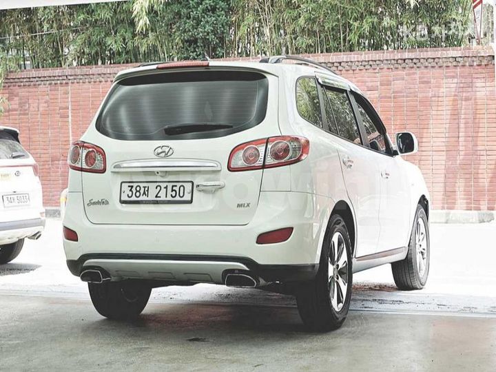 Hyundai SantaFe 2012 KMHSJ81UBCU885277 — 3