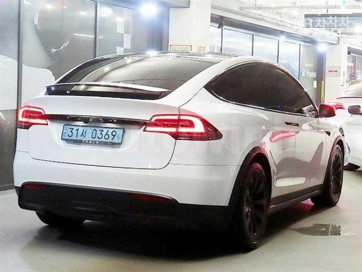 Tesla Model X 2023 7SAXCDE5XPF397698 — 4