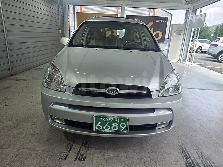 Kia Carens 2007 KNAFG52237K032852 — 3
