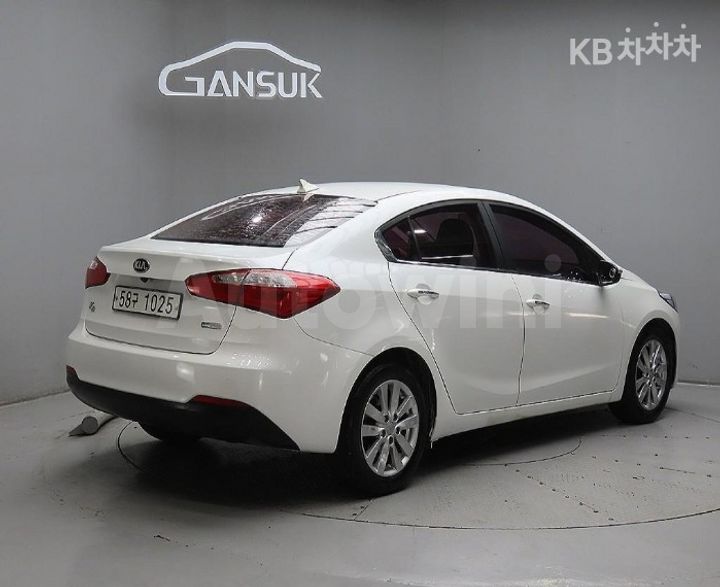 Kia K3 2015 — 4