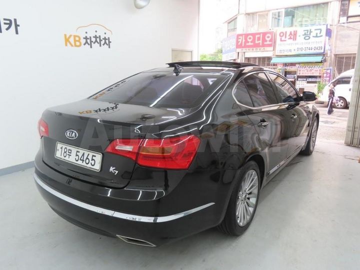 Kia K7 2010 KNALM412BAA018275 — 3