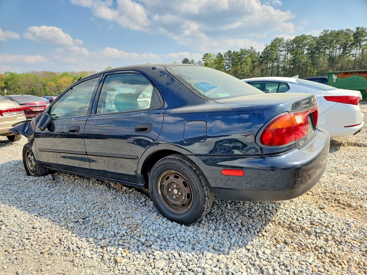 MAZDA PROTEGE 1996 — 3