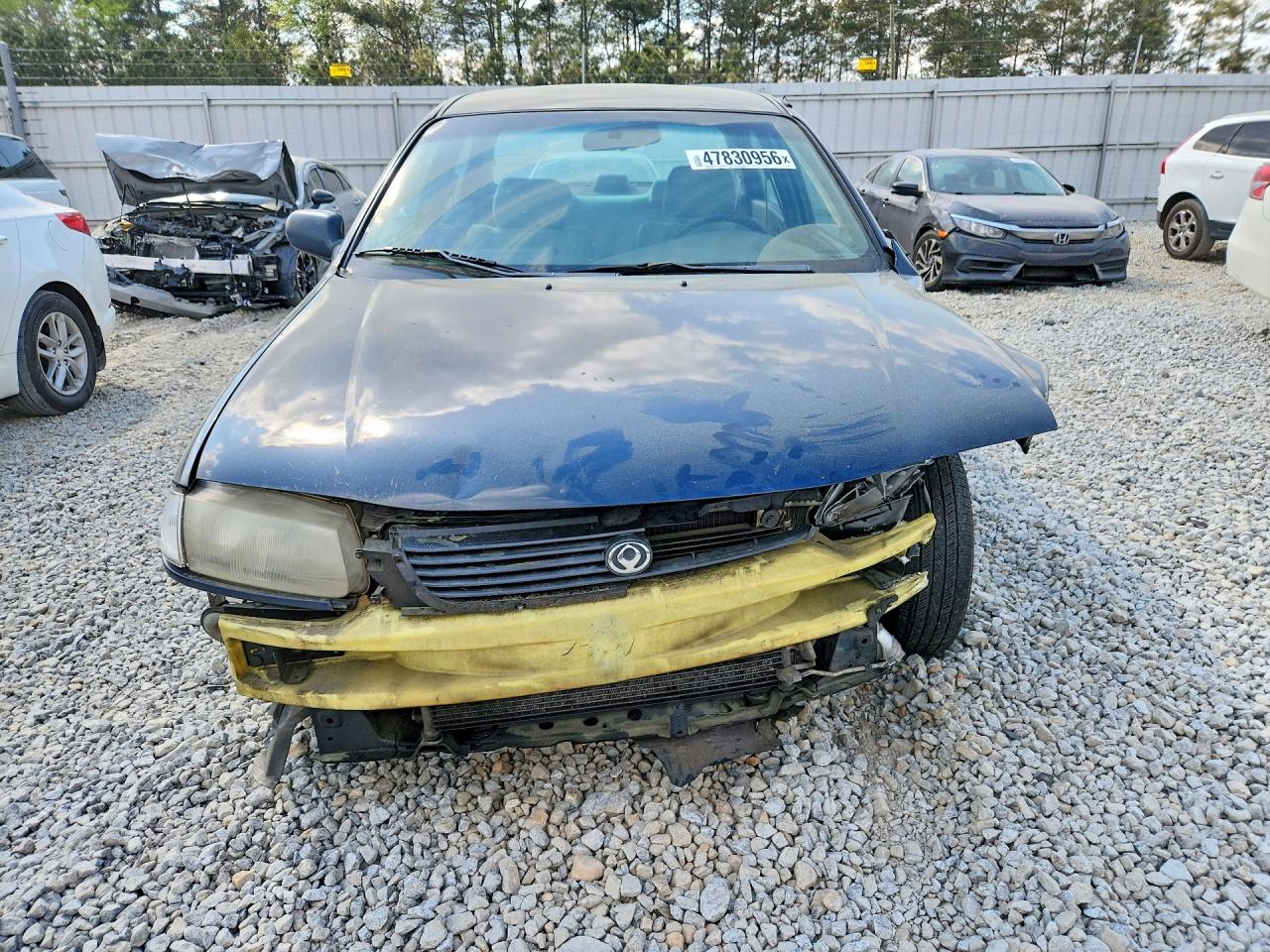 MAZDA PROTEGE 1996 — 6