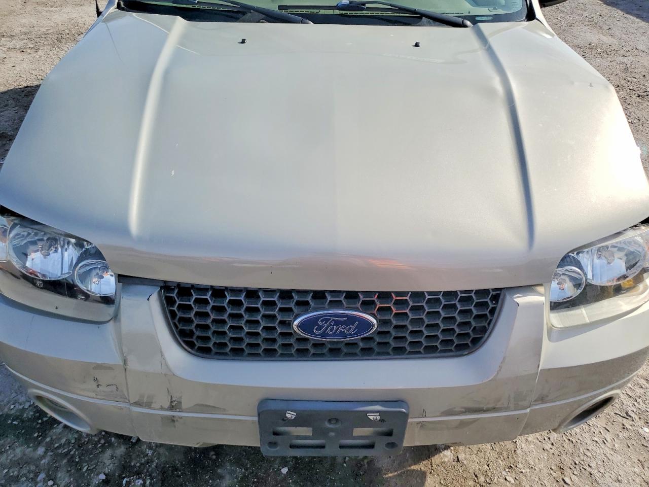 FORD ESCAPE 2005 — 13