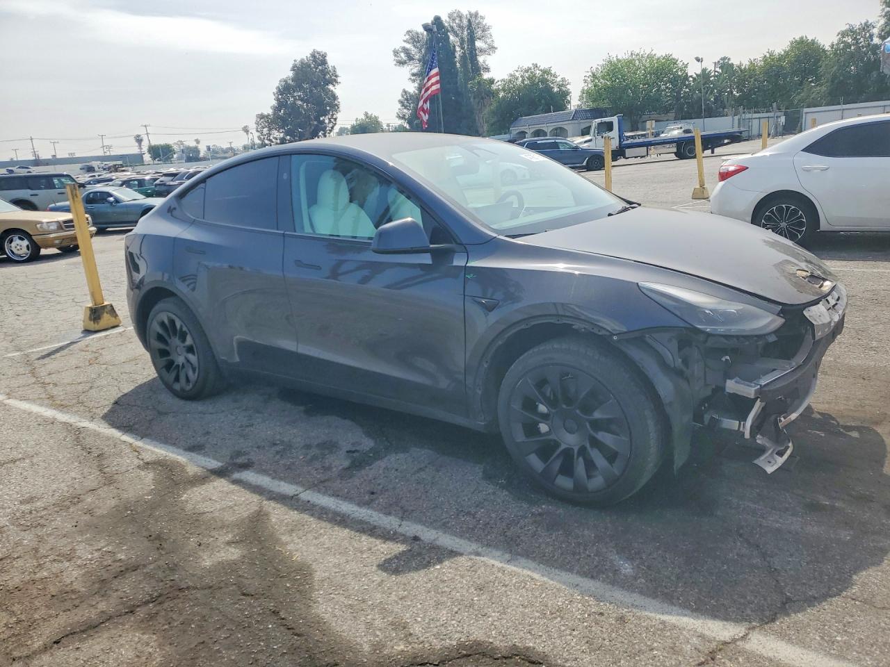 TESLA MODEL Y 2024 — 5