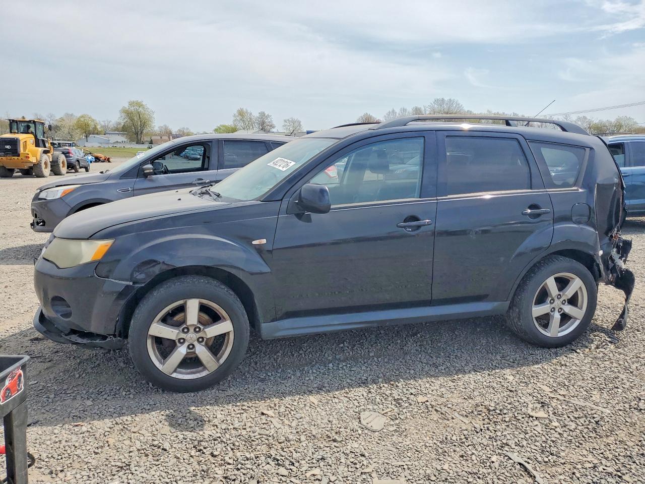 MITSUBISHI OUTLANDER 2009 — 2