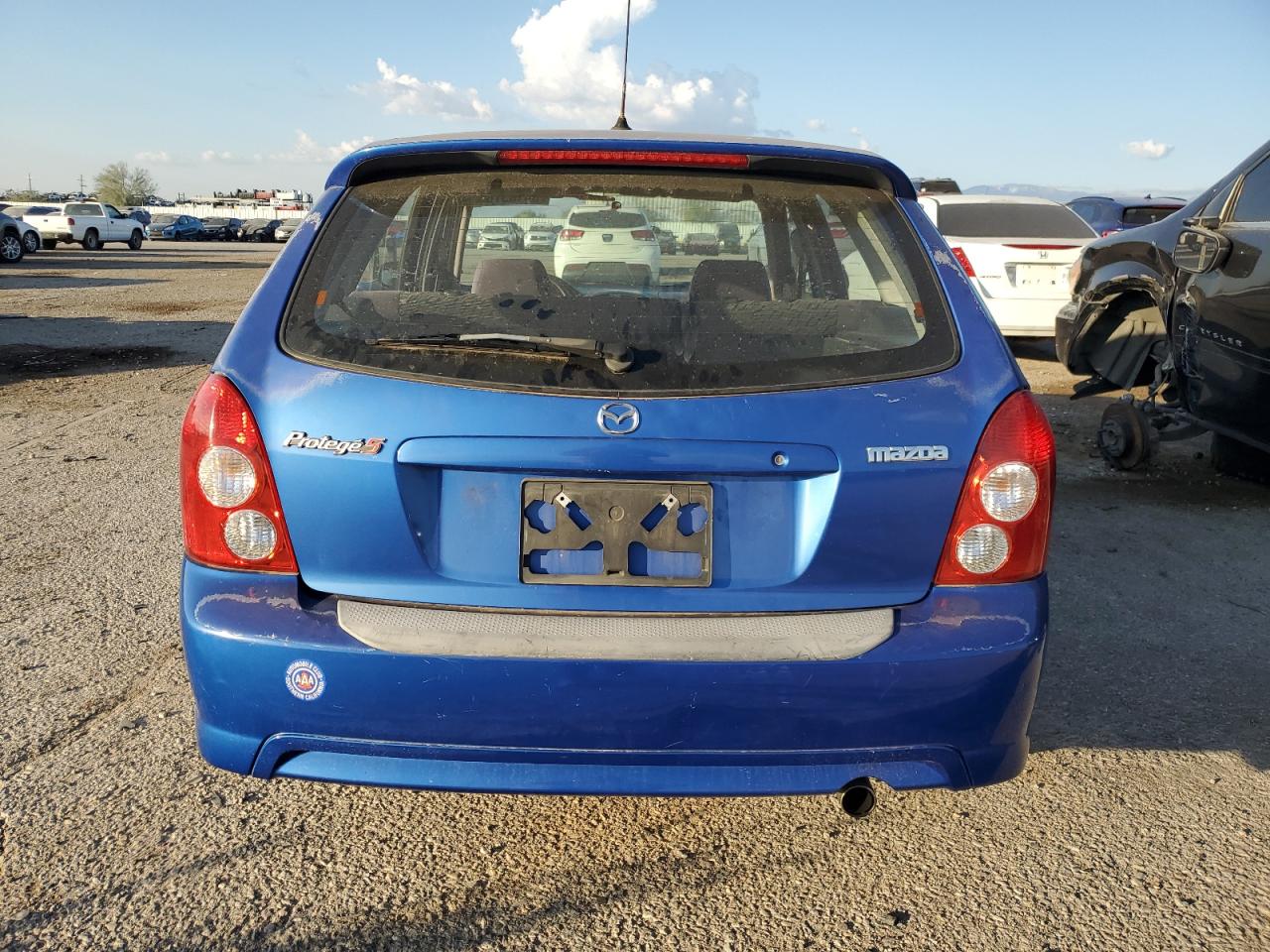 MAZDA PROTEGE 2003 — 7