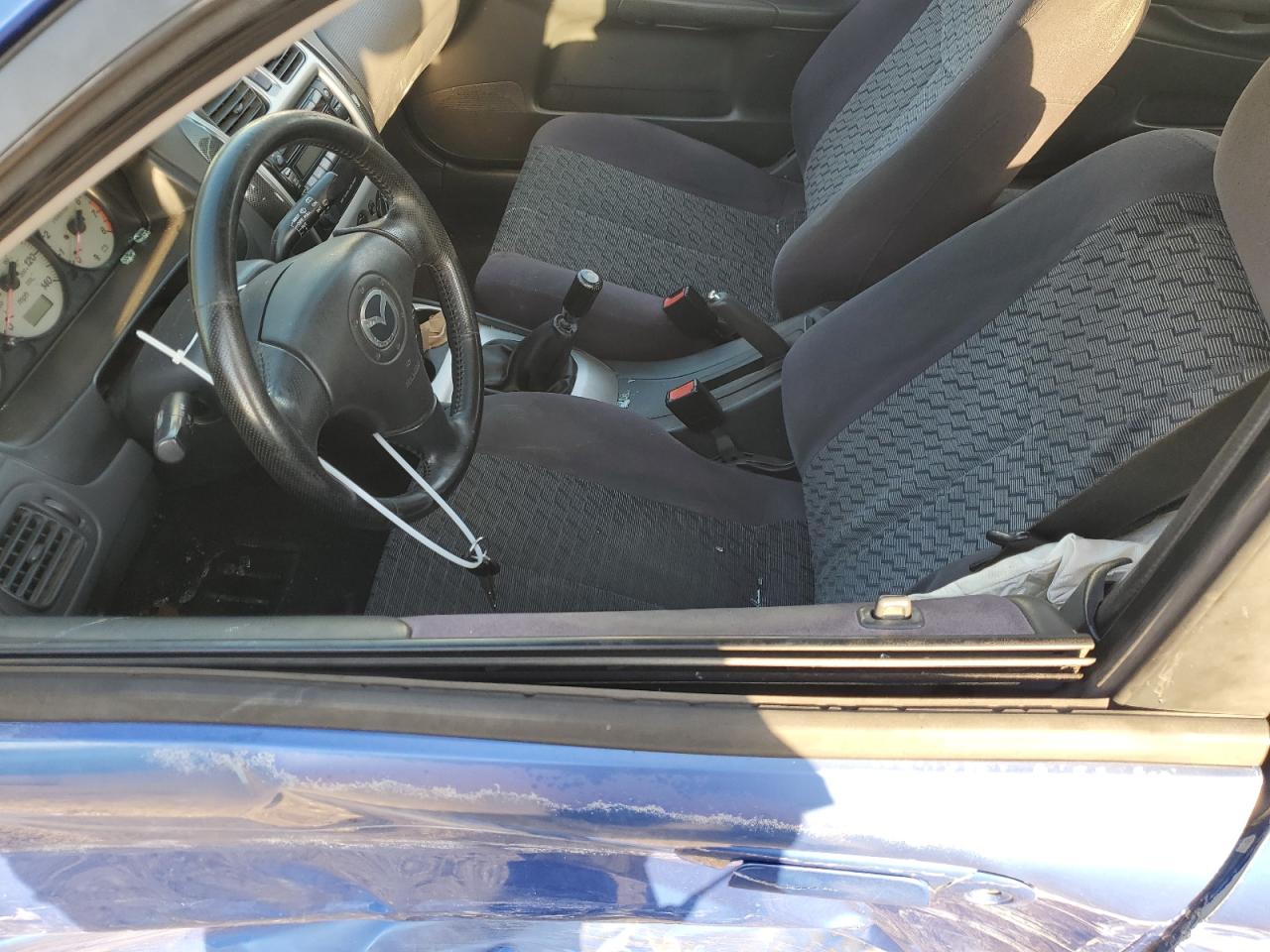 MAZDA PROTEGE 2003 — 8