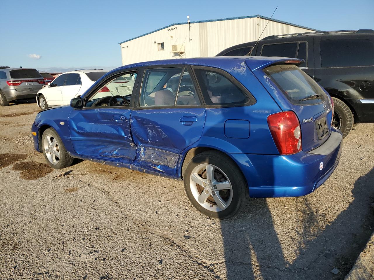MAZDA PROTEGE 2003 — 3